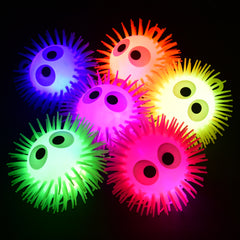 Flashing Puffer W/Eyes - 12 Count